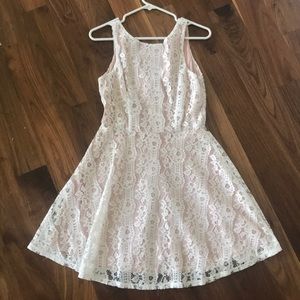 Nude underlay white lace overlay size med. dress.